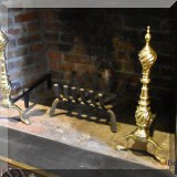 D24. Brass andirons. 23”h 